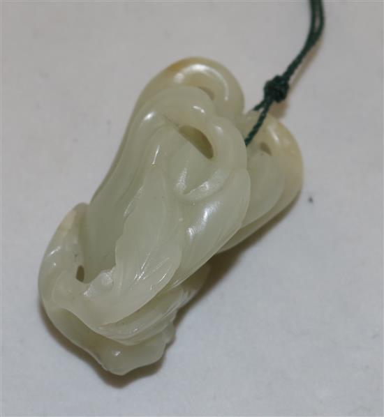 A Chinese pale celadon jade carving of a finger citron, 19th century, 4cm